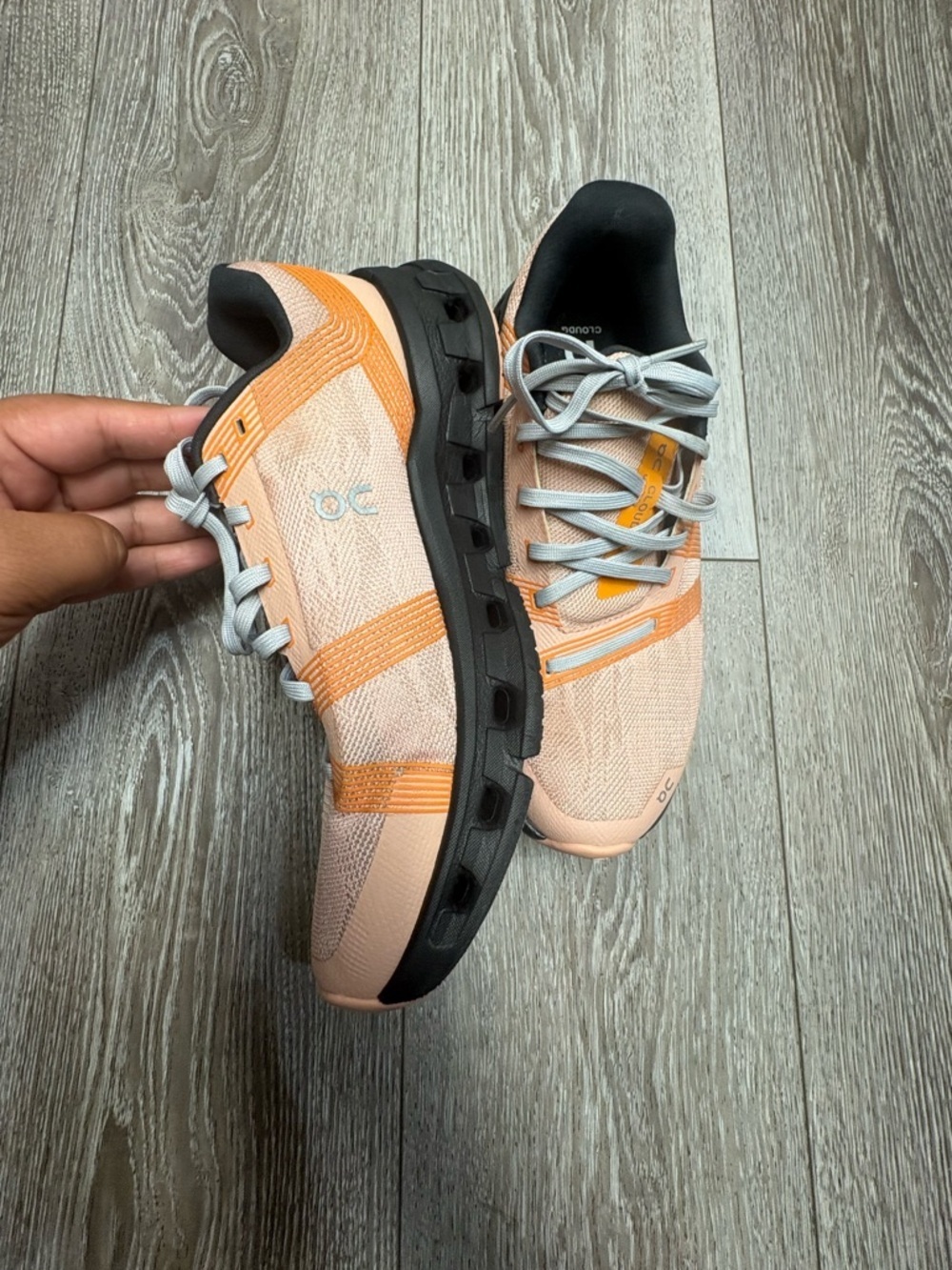 On Running cloudgo  Women's Peach and Black Cloud Trainer
